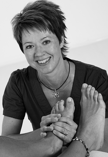 Sue masserar ftter